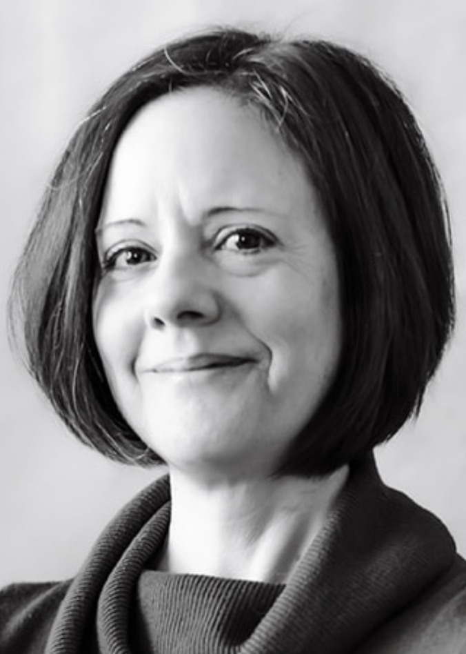black and white photo of woman smiling