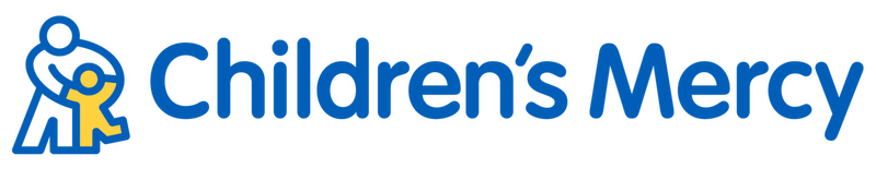 Parent with child next to Children's Mercy