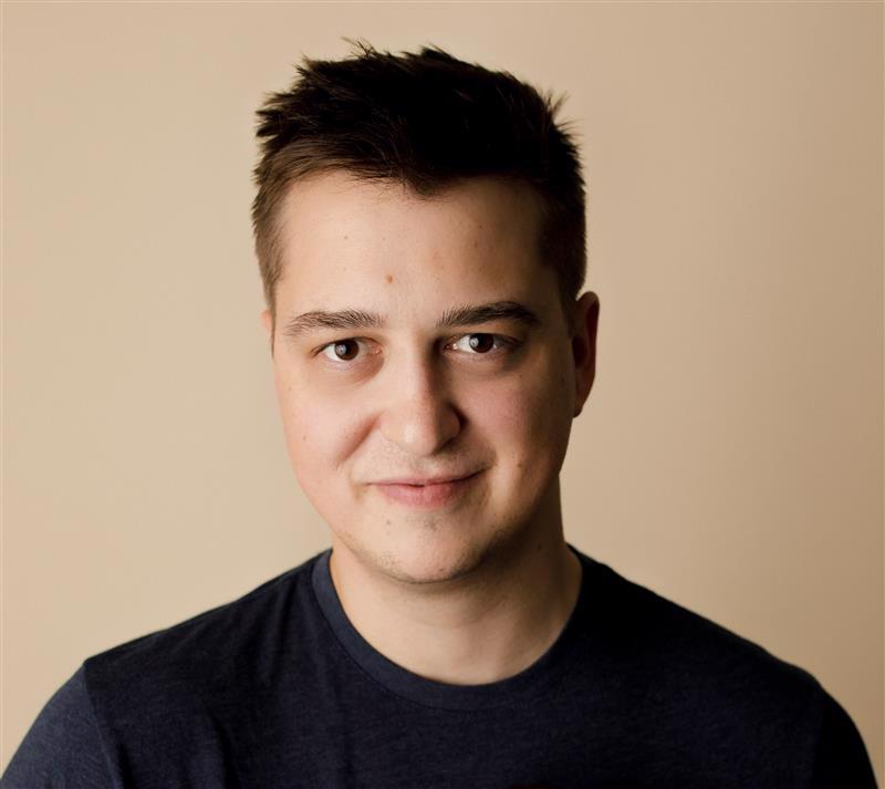 Smiling man in black t-shirt