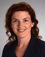 Image oLisa Cox smiling at camera wearing black topf Lisa