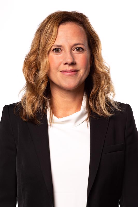 Image of Elin Grundberg wearing black jacket and white shirt