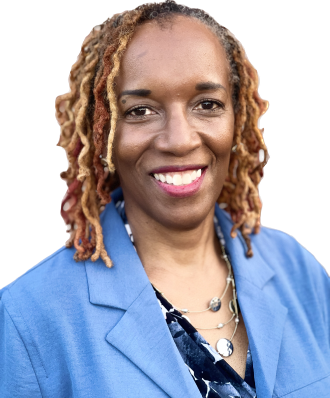 smiling woman in blue jacket, pattern shirt and three necklaces